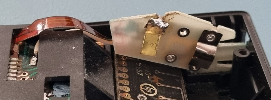 The cleaned battery connector PCB